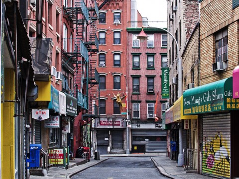 Photograph of vacant streets and closed shops and restaurants in Manhattan's Chinatown