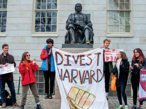 The author and fellow activists at a Divest Harvard rally this past April: (from left) Caleb Schwartz ’20, Flores-Jones, Anand Bradley ’19, Owen Torrey ’21, Eva Rosenfeld ’21, and Sophia Higgins ’21