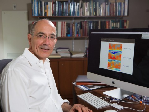 A portrait of Jerry Mitrovica at his desk