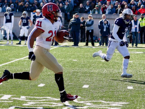 Photograph: With Yale’s Melvin Rouse II in vain pursuit, Harvard’s Aidan Borguet heads for the goal line.
