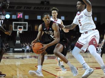 Agunwa Okolie '16 (shown here in previous action against Boston College) scored a career-high 29 points and made all 10 of his free throw attempts to lead Harvard to a 77-70 victory over Dartmouth.
