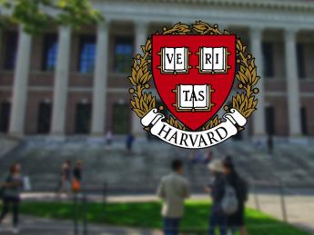 Harvard shield superimposed on image of Widener Library, a symbol of returning to operations