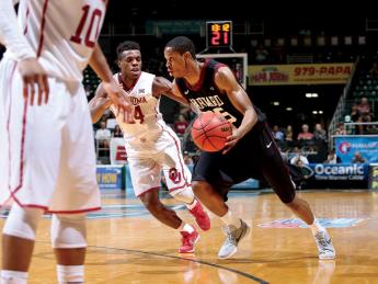 Agunwa Okolie ’16, the Ivy League Defensive Player of the Year, helped the Harvard men’s basketball team remain competitive during an injury-plagued season.