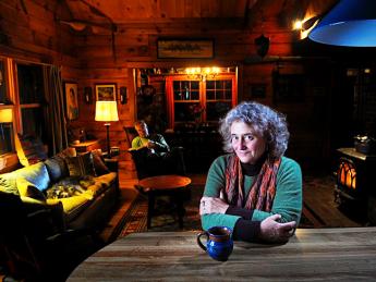 Joanne Ricca at her lakeside home in rural Maine with husband Martin Bartlett.