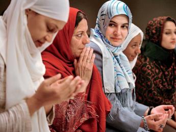 Wearing hijab, Muslim women from the United States and around the world meet in Manhattan in 2006 during the Women’s Islamic Initiative: Spirituality and Equity conference to discuss the issues and problems they face.