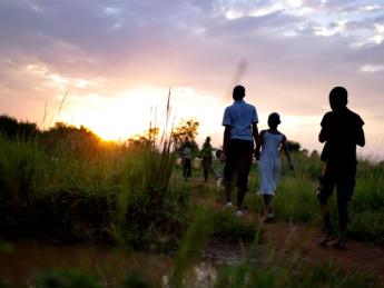 Children from New Hope orphanage in Busia, Uganda, make their nightly walk to get water for drinking and washing. They handle all the chores themselves—an important part of director Ken Mulago’s strategy for running the orphanage. “We want our children to behave as responsible adults,” he says. “We don’t want to raise them up just to think about themselves.”