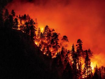 A California hillside burns