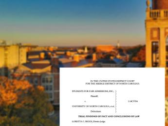 Court document in the foreground with UNC Chapel Hill bell tower in the background