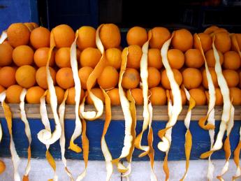 Oranges stacked for sale at a Moroccan bazaar
