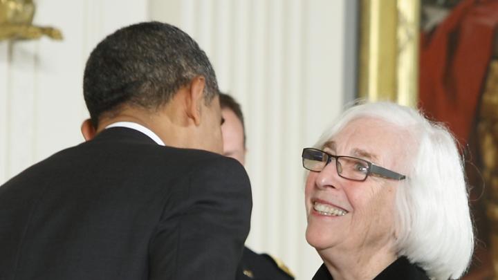 Emily Rauh Pulitzer receives her medal from President Obama at the White House on February 13, 2012.