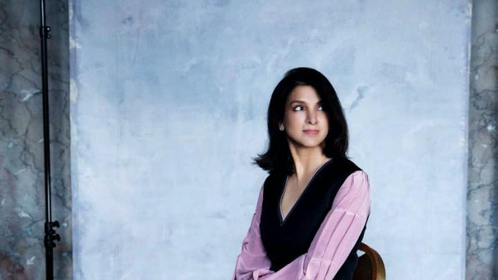 Vanity Fair editor-in-chief Radhika Jones poses stylishly in a studio 