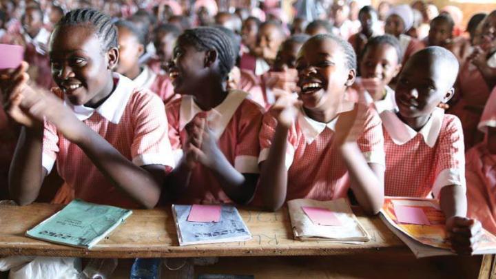 ZanaAfrica works with local, school-affiliated organizations in Kenya to reach young girls, like these students, who may need supplies and information.