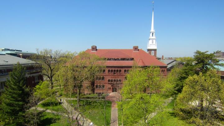 In Sever Quad, all paths converge on the Class of 1885 Gate. Sever Hall and Memorial Church  rise in the background. This view was taken from the roof of the Fogg Museum.