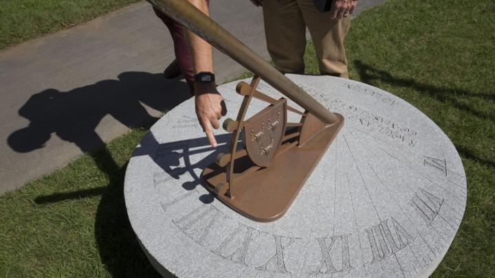 Photo of a sun dial in the Dunster courtyard