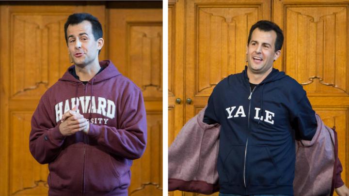 Photo of David Malan taking off his Harvard sweatshirt to reveal a Yale one