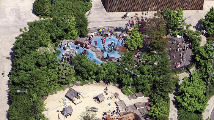 Pier 6: an aerial view of the playground, with greenery and water and sand play features for New York children of all ages