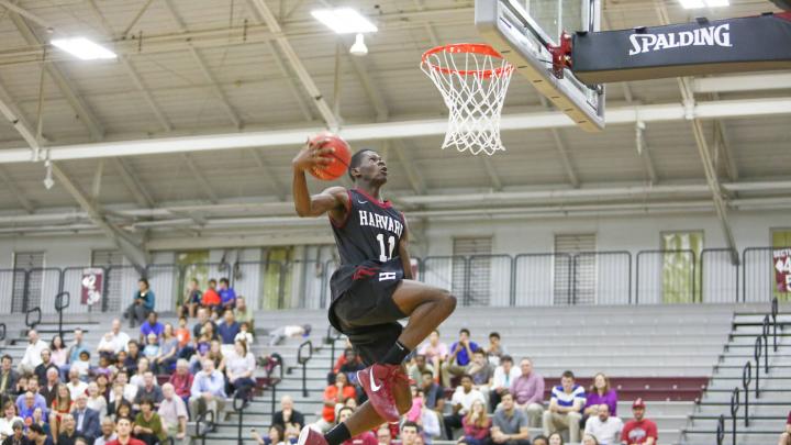 Freshman Chris Egi (shown here participating in Friday's dunk contest) will compete for playing time in a crowded Harvard frontcourt.
