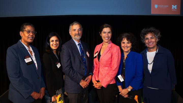 A group photo of six participants in the joint Harvard-University of Michigan summit on opioids