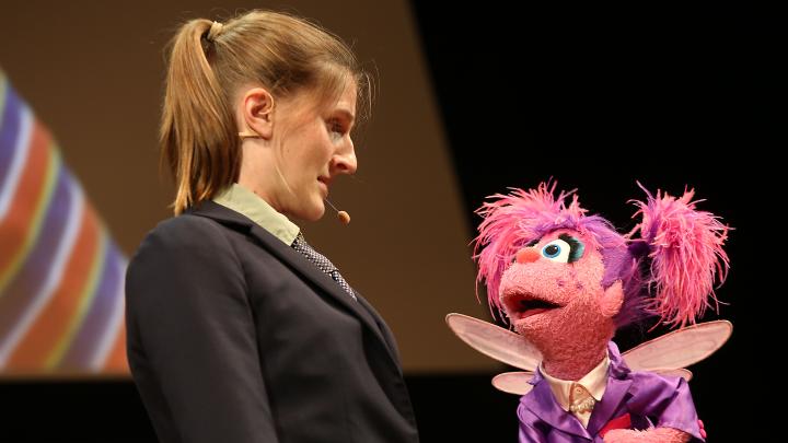  Muppet Abby Cadabby sings with a member of Hasty Pudding Theatricals.